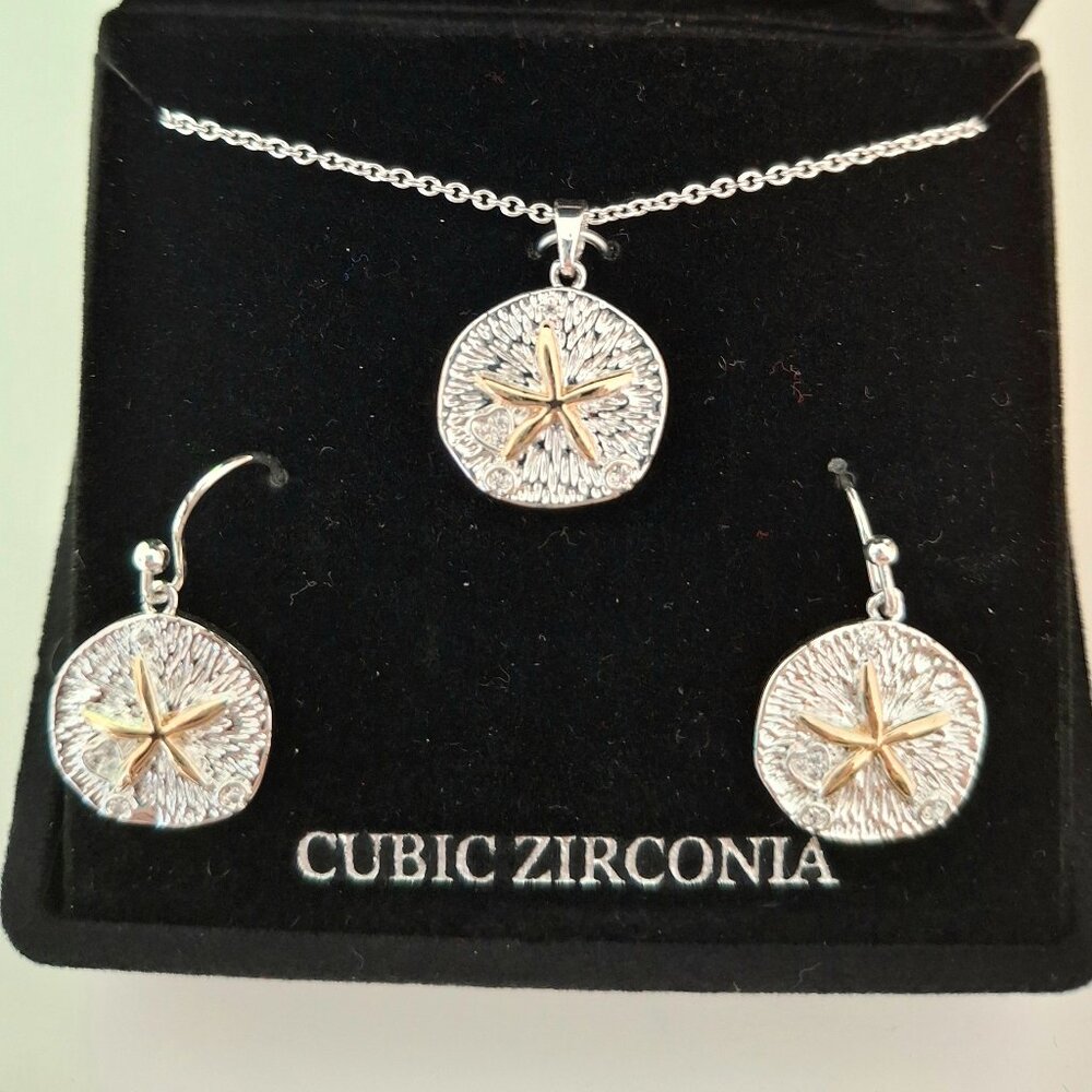 New in Box- two tone starfish earring and pendant set (adjustable chain)